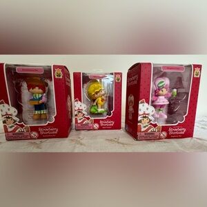 Strawberry Shortcake figurines.
